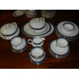 A Royal Doulton dinner service for eight place settings.