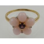 An unusual Peruvian pink opal, amethyst, and diamond floral cluster ring.