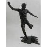 A 20th century bronze figure of a footballer.