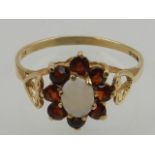 A 9 carat yellow gold, garnet,