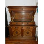 An early 20th century continental walnut sideboard,