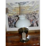 A brass oil lamp,