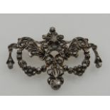 A late 19th century French silver and yellow gold diamond set girandole brooch in the Belle Epoque