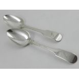 A pair of silver ladles,