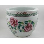 A 20th century Chinese jardiniere, decorated with flora and fauna.