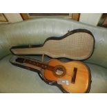 A mid 20th century Spanish acoustic guitar, dated 1956.