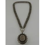 A Victorian silver filigree pendant,