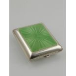 A Tiffany & Co silver white metal case, guilloche enamelled in apple green, stamped sterling L.