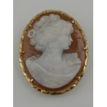 A 9 carat yellow gold mounted cameo decorated with a profile portrait of a lady