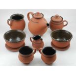 A late 20th century terracotta tea set,