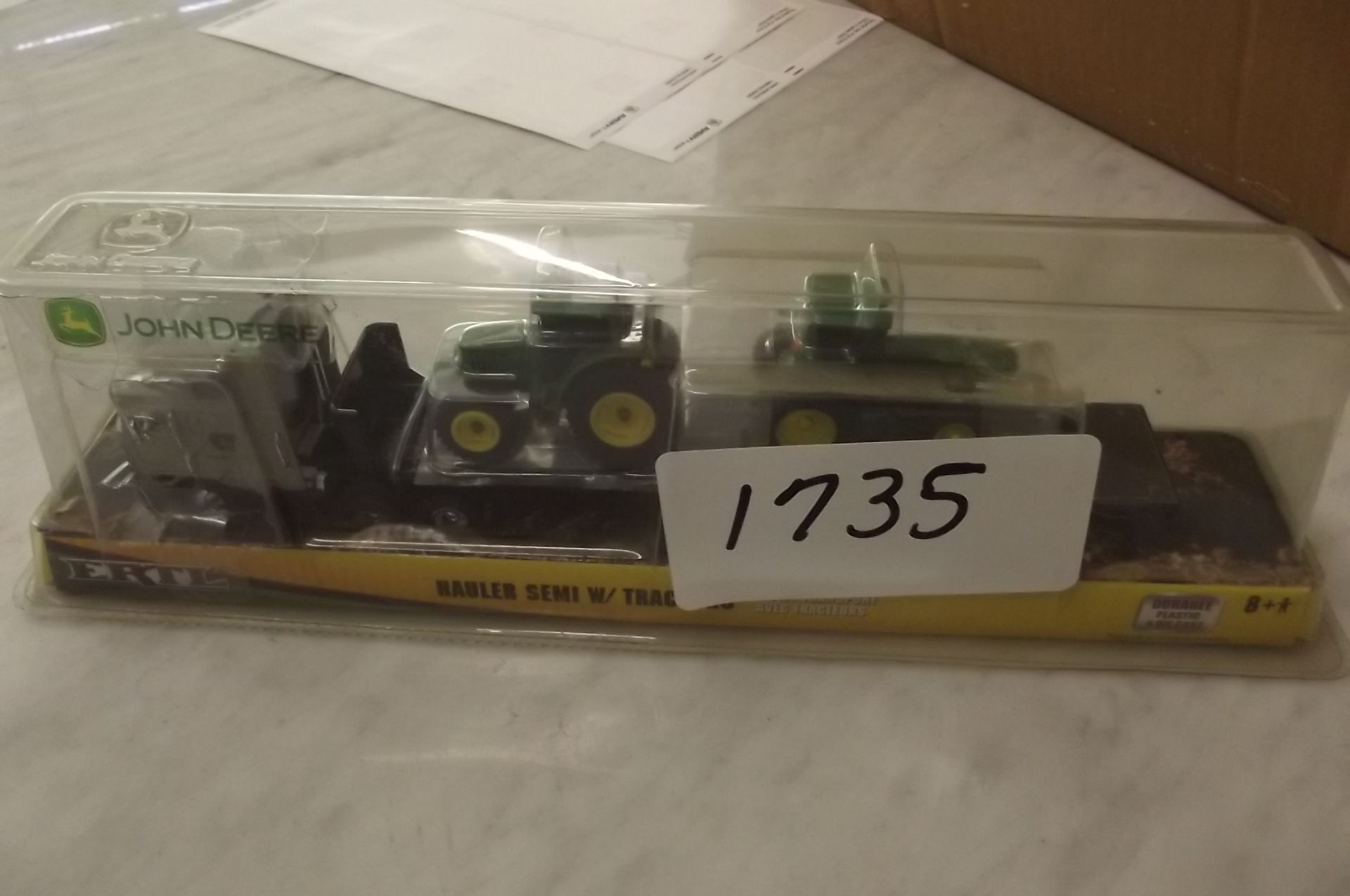 Lot 1735 - TOY TRACTOR  JOHN DEERE SEMI-HAULER WITH TRACTORS