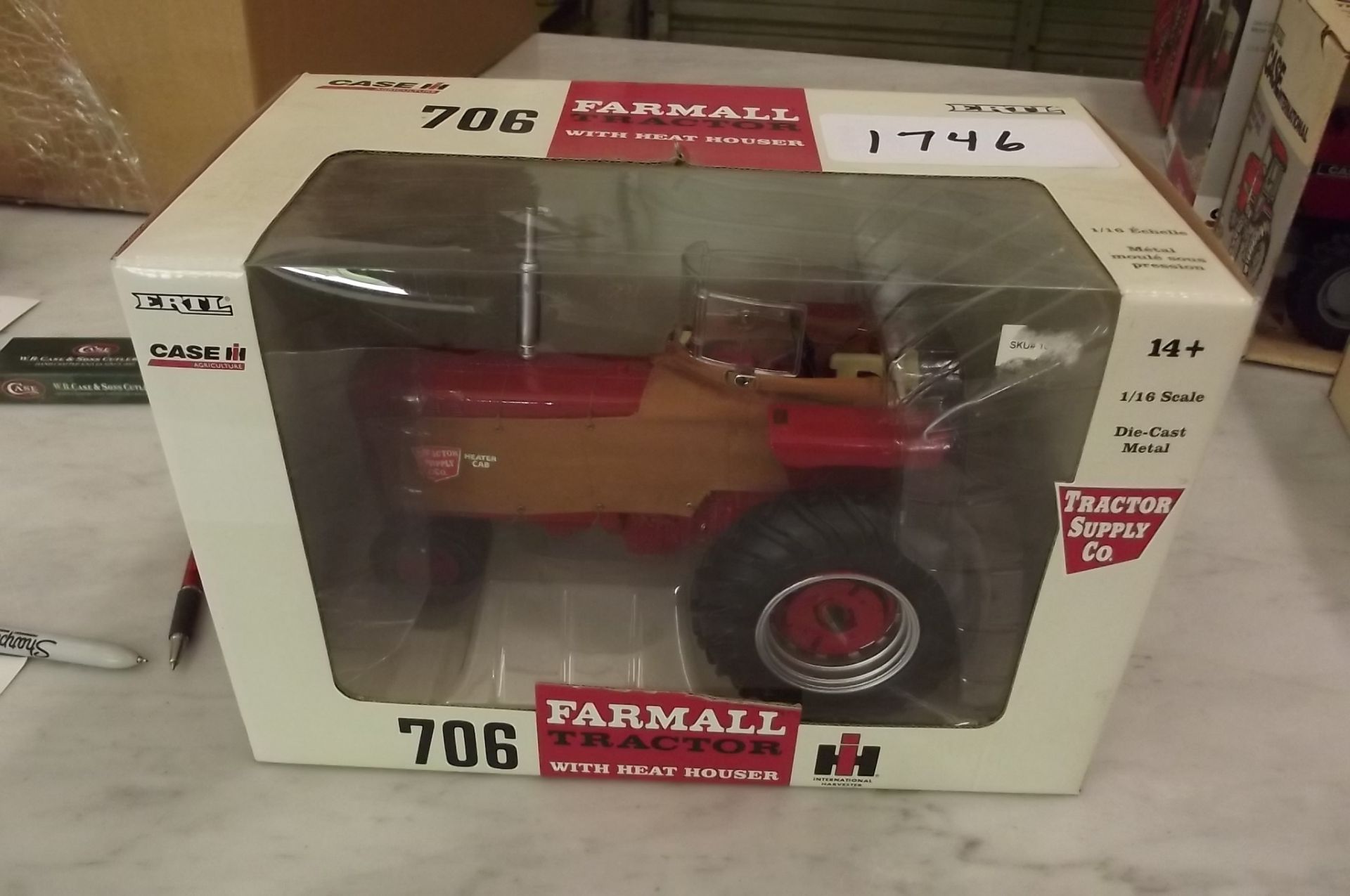 Lot 1746 TOY TRACTOR FARMALL 706 WITH HEAT HOUSER CAB