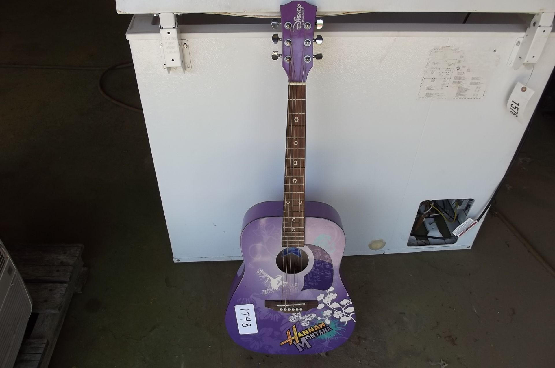 Lot 1748 HANNAH MONTANA PURPLE GUITAR