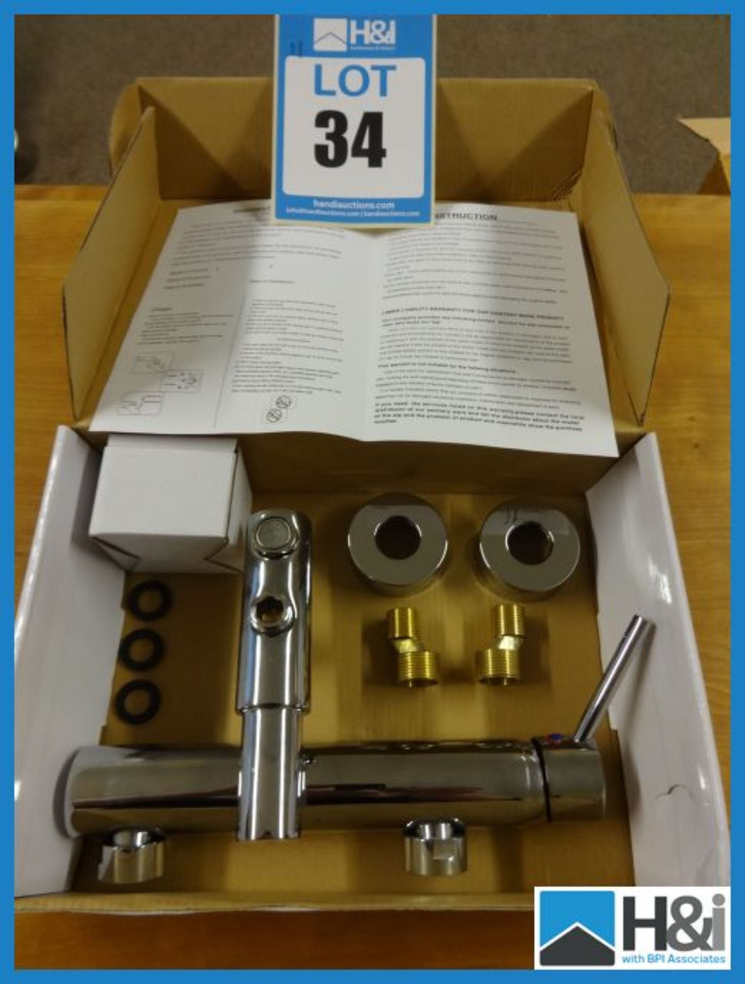 New boxed wall mounted bath filler mixer tap with fixings and facility for shower hose to be