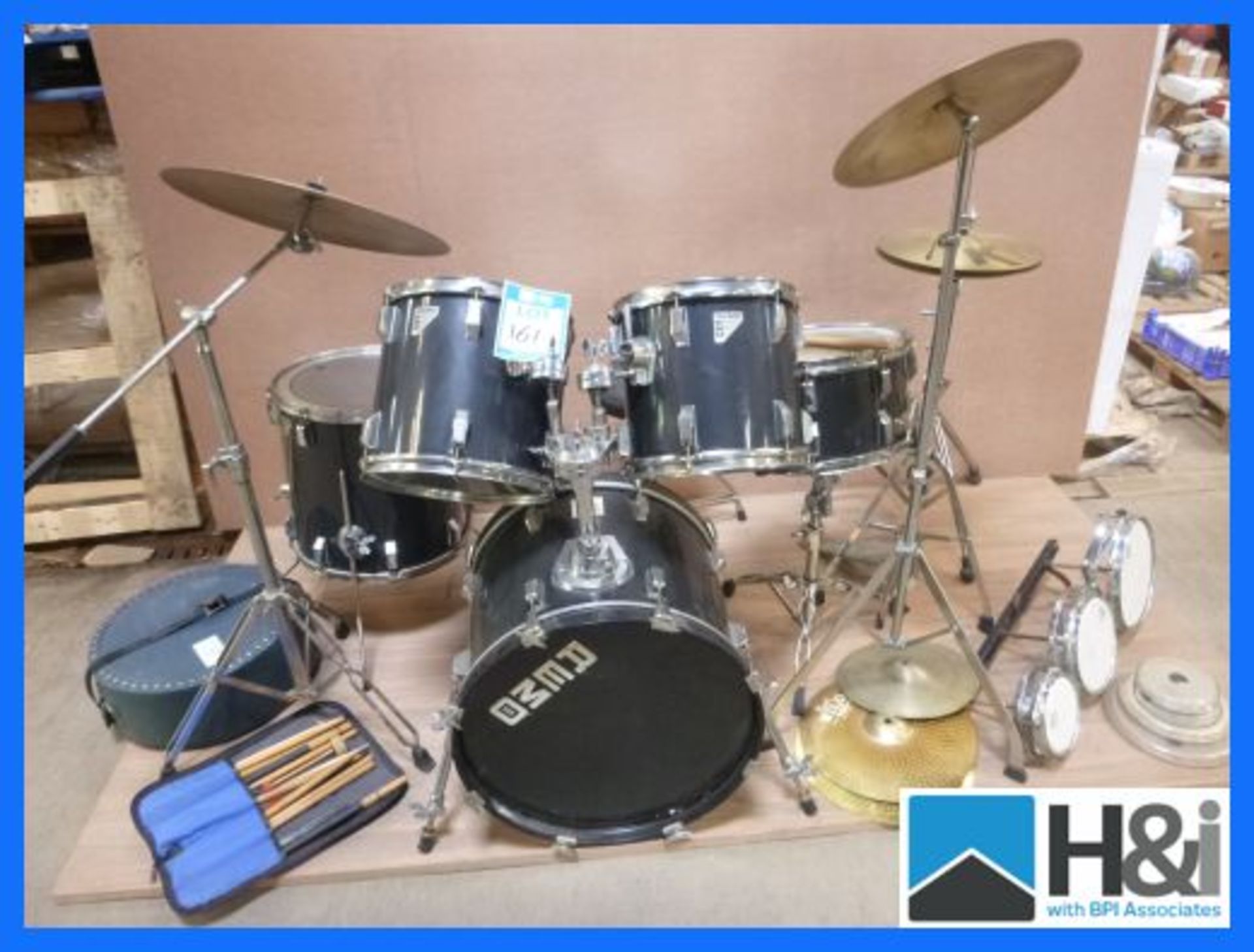 Remo Quadura professional 5 piece drum kit with extra trio of rack toms, ride cymbal, crash cymbal,