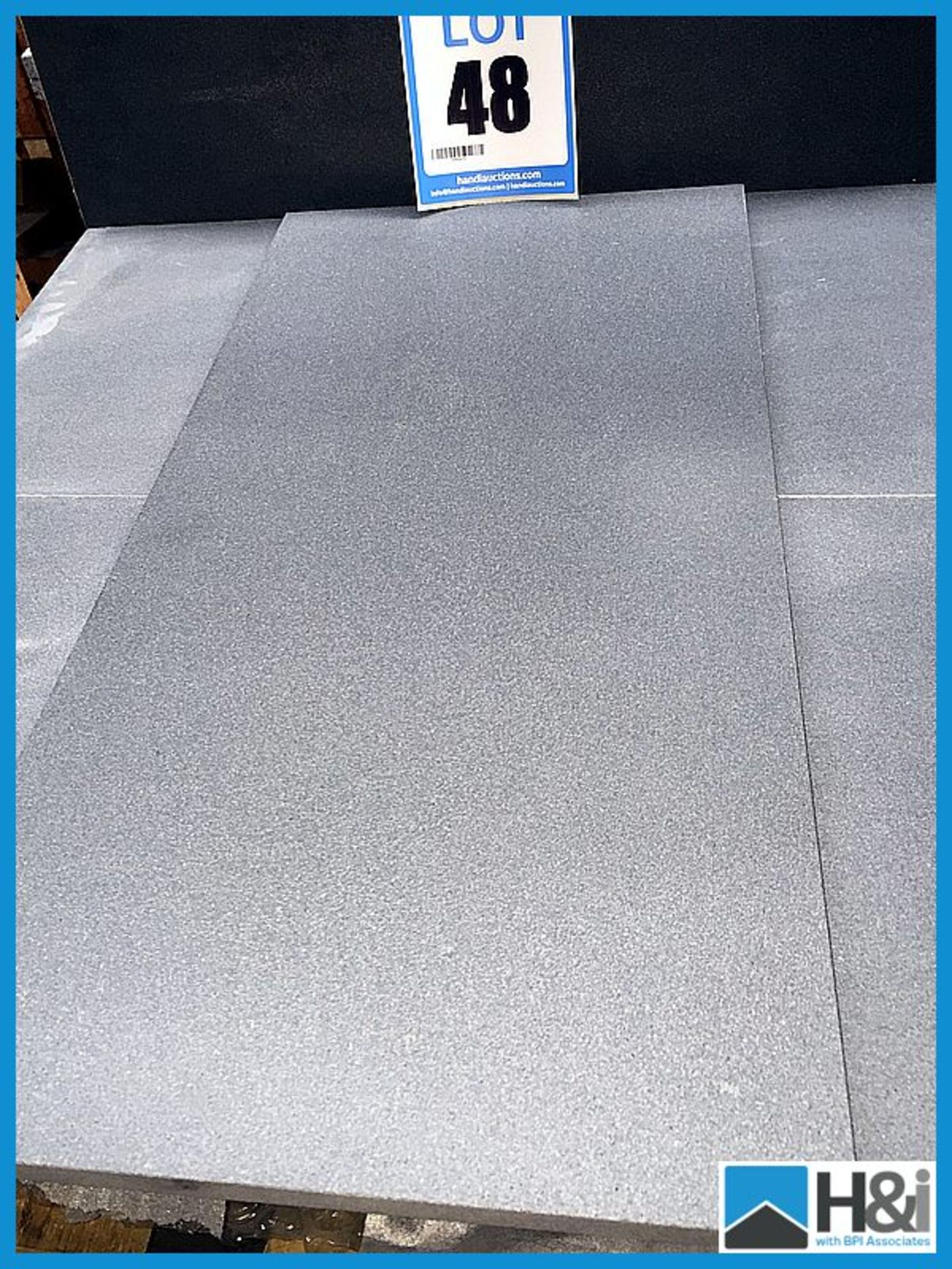 Light grey honed basalt tiles 600 x 300 x 10.5 - 10 sq meters per lot Appraisal: Good Serial No: