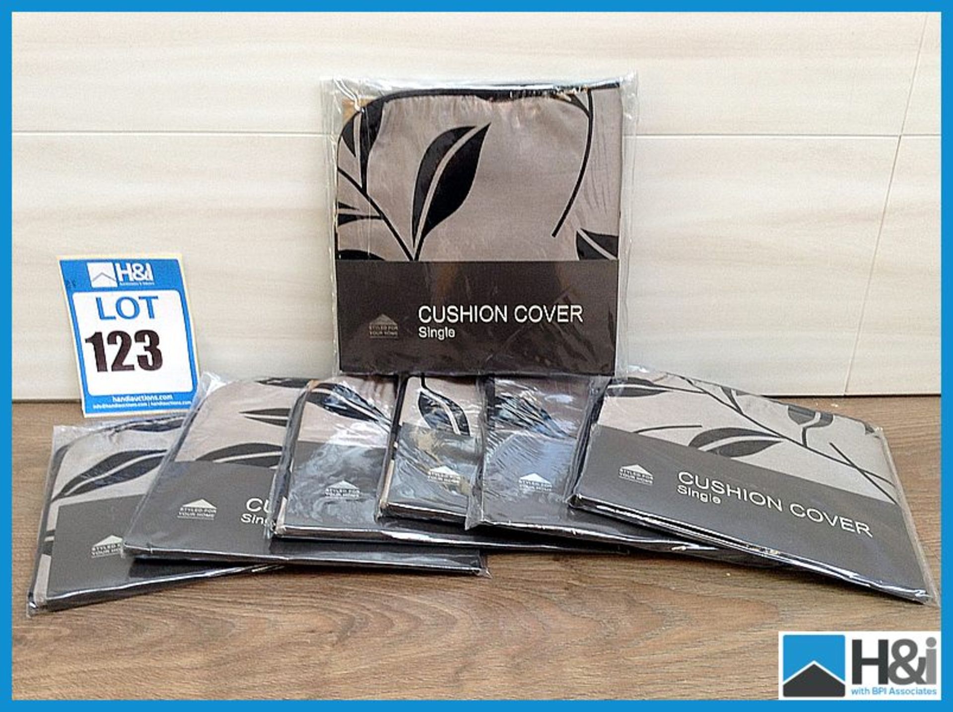 7 qty light brown with peru black leaf effect cushion covers Appraisal: Good Serial No: NA Location: