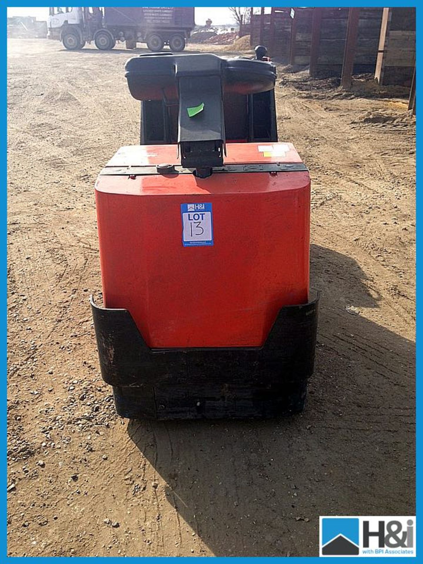 BT stand on power pallet truck model OS2.0 rated capacity 2000kgs with 24v battery appx 700 hours - Image 2 of 5