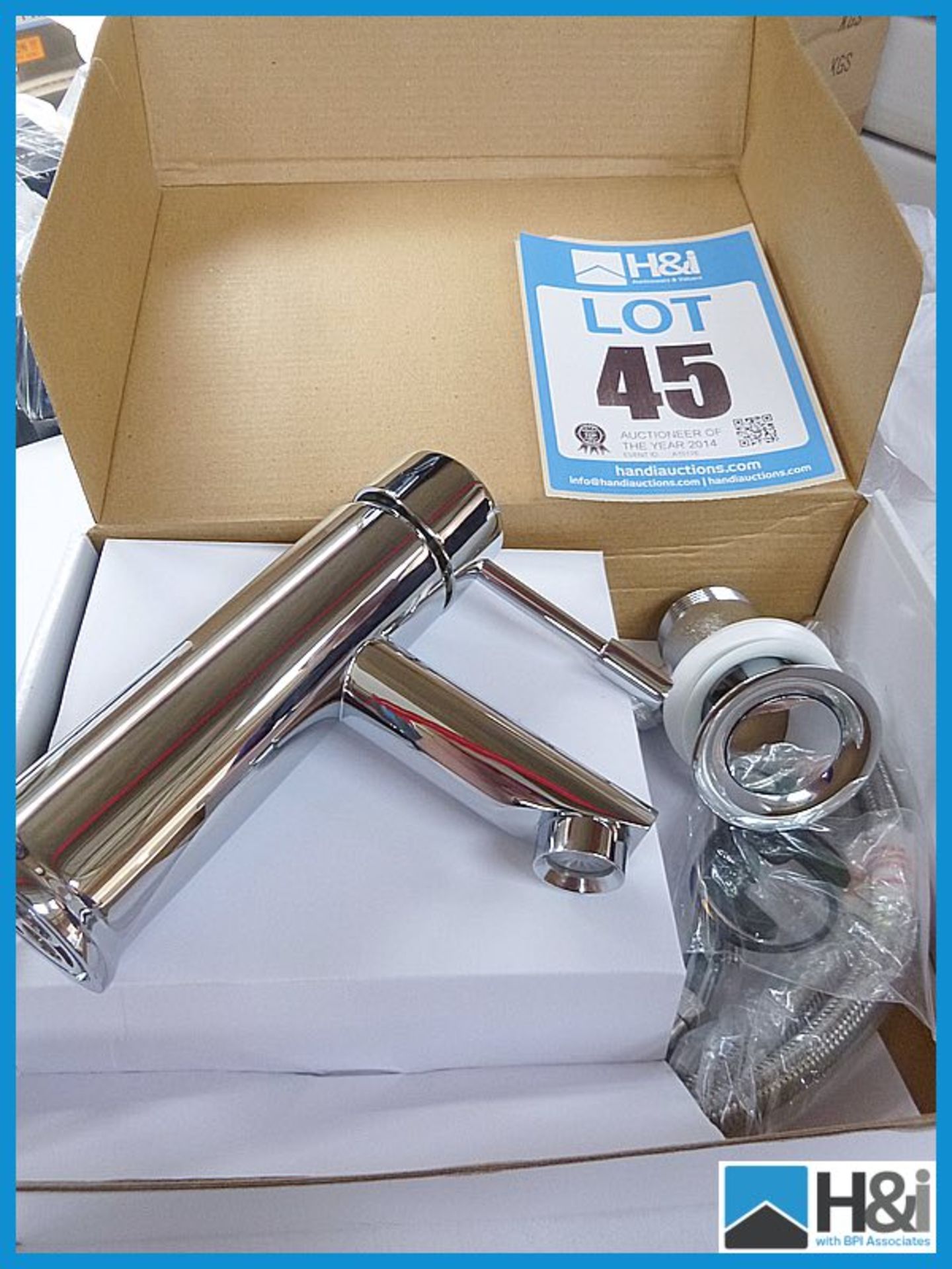 Mayfair designer basin monobloc chrome tap with pop up waste. Boxed and new. RRP £199 Appraisal: