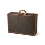 Louis Vuitton valise rigide Alzer 60 en toile enduite monogrammée châssis indépendant numéro de