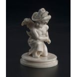 Figurine en ivoire probablement Flandres XVIIe s &nbsp représentant Eros chapeauté et agenouillé