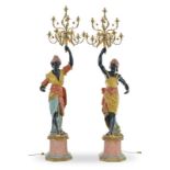 Paire de porte-torchères de style Napoléon III XXe s. en bois polychrome représentant un couple de