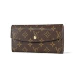 Louis Vuitton porte-monnaie et porte carte en toile enduite monogrammée 10x18 5 et 7x16 5 cm