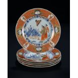 &nbsp 4 assiettes au décor de femmes et parasol dans la palette Imari Chine XVIIIe s. diam. 23 cm