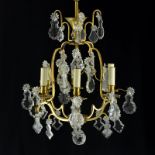 Lustre cage de style Louis XV XXe s. à six bras de lumière pampilles sabres et boule facettée h.