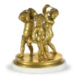 Clodion (1738-1814)	 d'après	 Enfants musiciens	 groupe en bronze à patine dorée	 sur un socle en