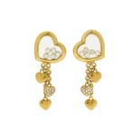 Chopard	 Happy Diamonds	 paire de boucles d'oreilles en or 750 à décor de coeurs retenant chacune