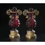 Paire de vase en verre rubis taillé et bronze doré	 Russie XIXe s.	 de forme sphérique le socle à