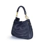 Christian Dior	 sac tote en cuir d'agneau noir plissé	 courroies sur les côtés	 housse	 30x38 cm