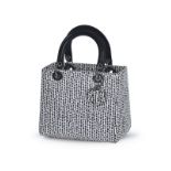 Christian Dior	 sac Lady Dior en python blanc à pois	 poignées en cuir noir	 bouclerie noircie