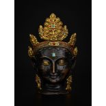 Tête&nbsp	d'un&nbsp	bodhisattva&nbsp	en bronze à patine noire	 Himalaya	 XIXe-XXe s.	 tiare	 boucles