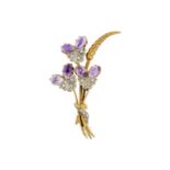 Broche bouquet 2 ors 750 sertie d?améthystes taille cabochon et diamants taille 8/8	 h. 5 cm	 12g