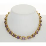 Collier en or 750 serti d'améthystes taille rond	 long. 38 cm	 48g