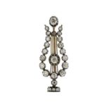 Pendentif-broche lyre XIXe s. en or 585 et argent sertie de diamants taille ancienne	 h. 5 cm