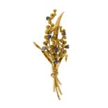 Broche bouquet 2 ors 750 perlé sertie de saphirs taille rond	 long. 7 cm	 14g