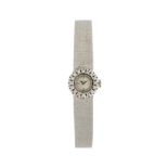 Longines	 montre-bracelet en or gris 750 sertie de diamantsSignée LonginesCadran argenté mat