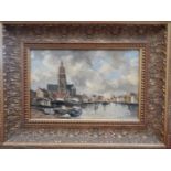 J.H Van Mastenbroek.  Oils on panel - View of a Dutch Riverside Town' in an ornate gilt frame