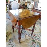 A Gillows mahogany games table with square top inset chessboard, fitted four rounded drop flaps,