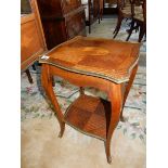 A French mahogany occasional table with rectangular top inset quarter panels and flowers, gilt metal