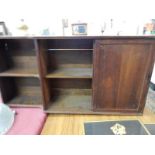 An Edwardian mahogany wall hanging cabinet fitted two sliding doors