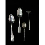 An ornamental silver spoon with Celtic decoration, a silver fork with mother of pearl handle, an