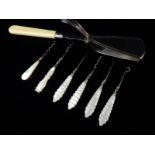 A pair of silver plated sandwich servers and six steel corkscrews with mother of pearl handles