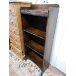 A small oak openfront bookcase with moulded decoration