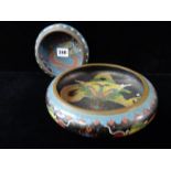 Two shallow Cloisonné bowls, blue and black ground decorated dragons