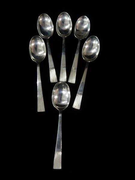A set of six silver coffee spoons with fluted handles - Sheffield 1944