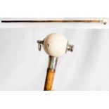 A Briggs walking cane, the silver mounted and white spherical handle with taxi whistle - London 1919